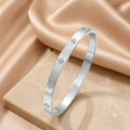 Edelstahl-Armreif mit Kleeblatt-Motiven & Zirkonia – Elegantes Silber-Bicolor-Armband