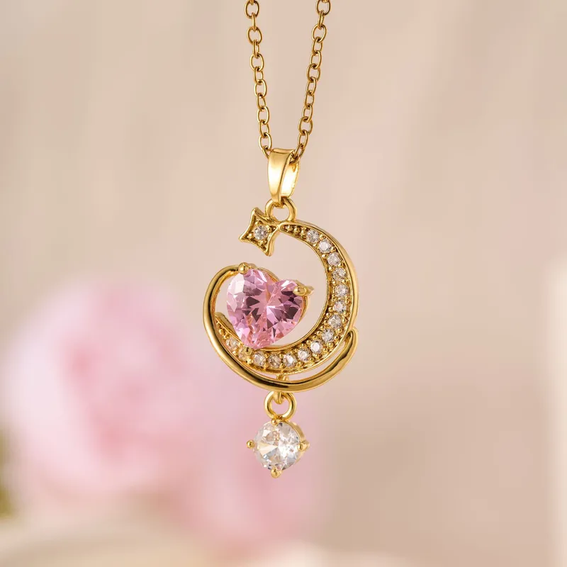 Elegante Edelstahl-Halskette in Gold mit Mond, rosa Herz-Zirkonia & Stern